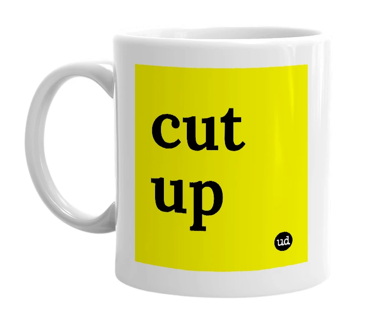 White mug with 'cut up' in bold black letters