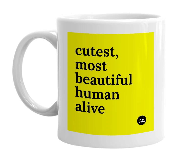 White mug with 'cutest, most beautiful human alive' in bold black letters