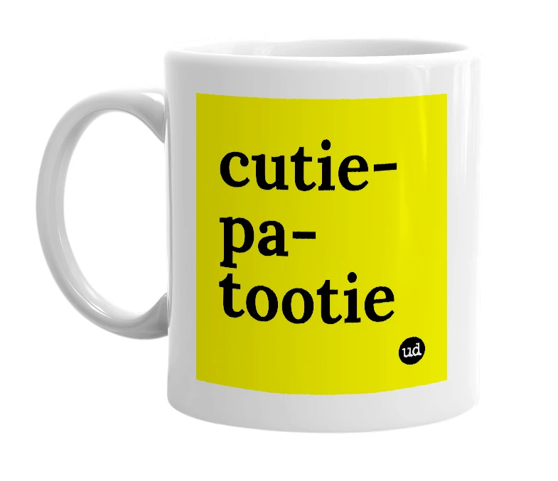 White mug with 'cutie-pa-tootie' in bold black letters