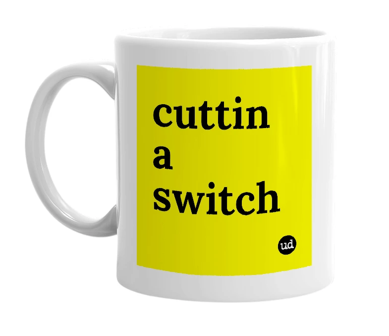 White mug with 'cuttin a switch' in bold black letters