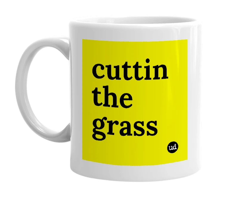 White mug with 'cuttin the grass' in bold black letters