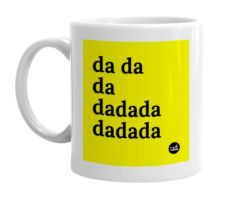 White mug with 'da da da dadada dadada' in bold black letters