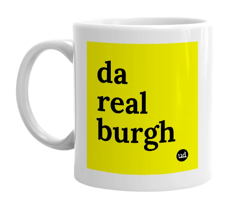 White mug with 'da real burgh' in bold black letters