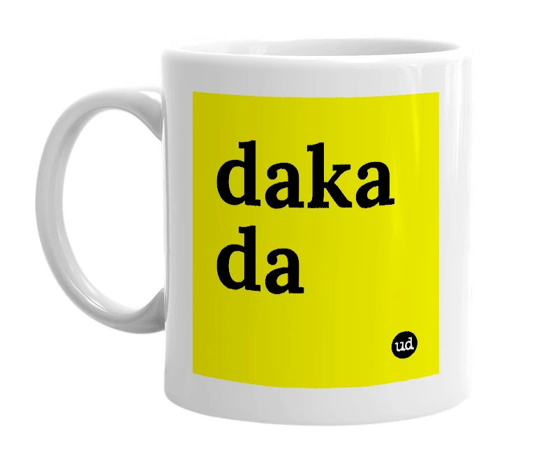 White mug with 'daka da' in bold black letters