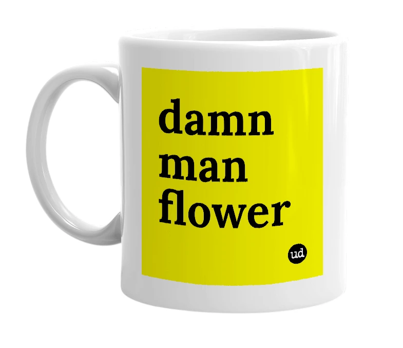 White mug with 'damn man flower' in bold black letters