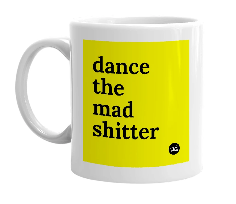 White mug with 'dance the mad shitter' in bold black letters
