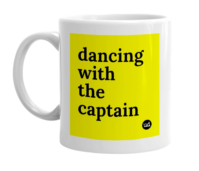 White mug with 'dancing with the captain' in bold black letters