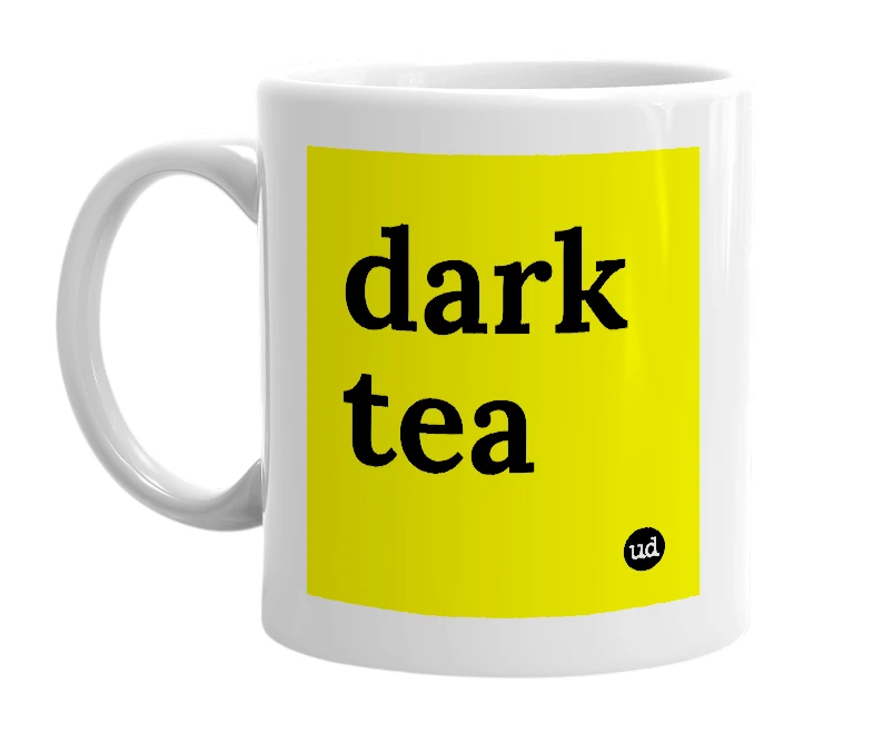 White mug with 'dark tea' in bold black letters