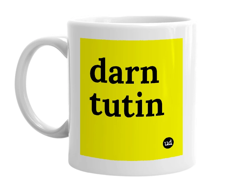 White mug with 'darn tutin' in bold black letters