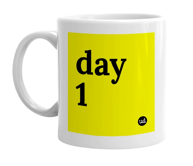 White mug with 'day 1' in bold black letters