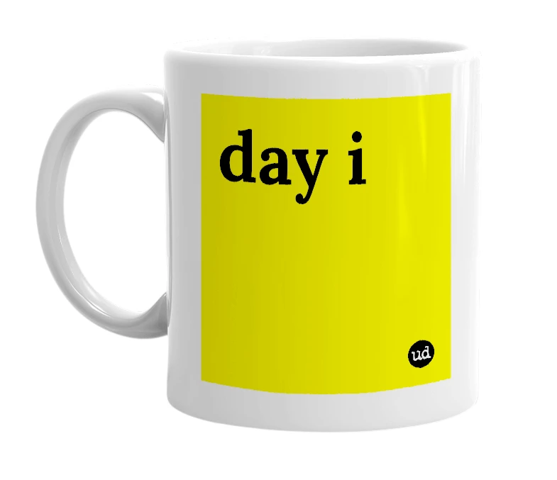 White mug with 'day i' in bold black letters