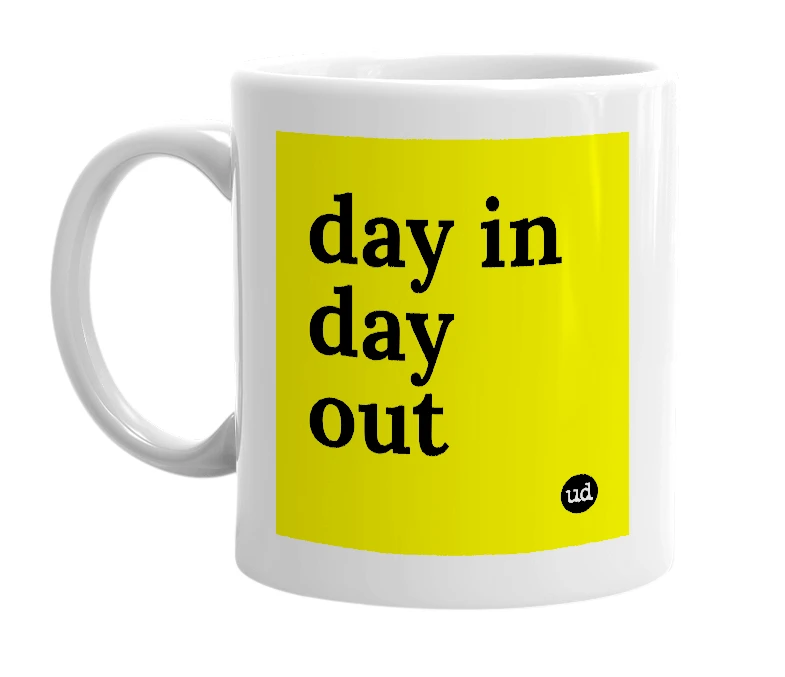 White mug with 'day in day out' in bold black letters