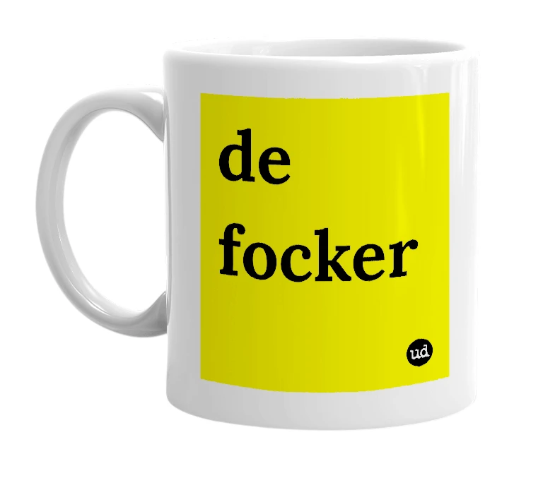 White mug with 'de focker' in bold black letters