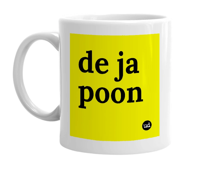 White mug with 'de ja poon' in bold black letters