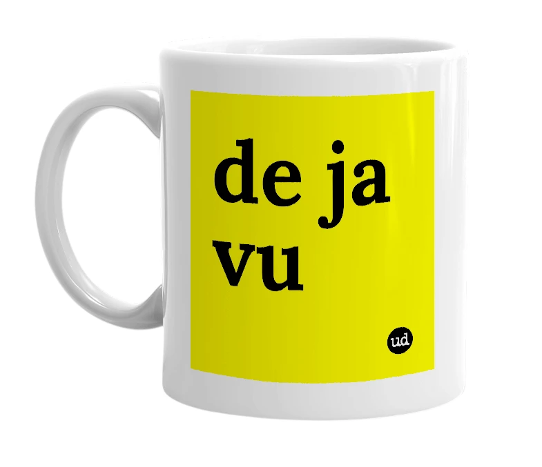 White mug with 'de ja vu' in bold black letters