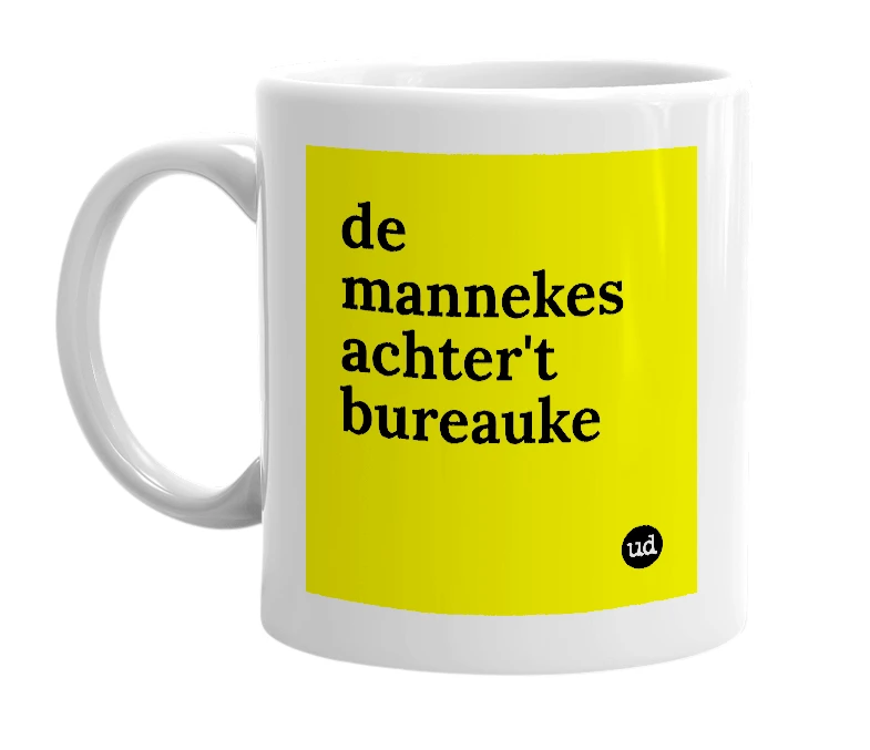 White mug with 'de mannekes achter't bureauke' in bold black letters