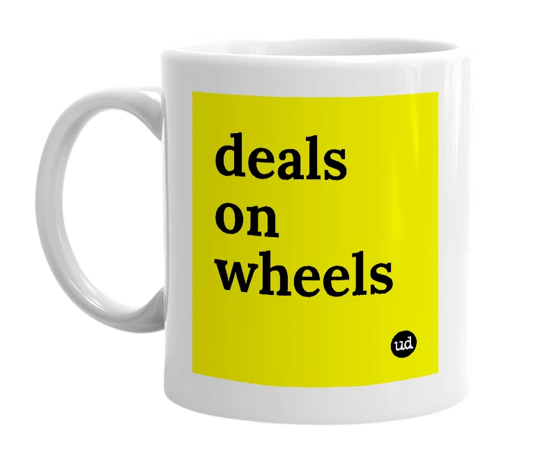 White mug with 'deals on wheels' in bold black letters
