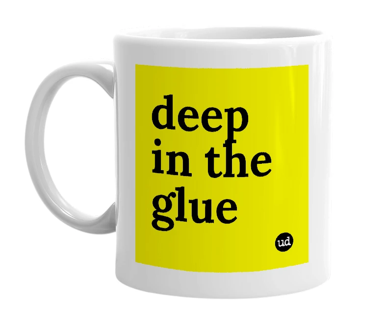 White mug with 'deep in the glue' in bold black letters