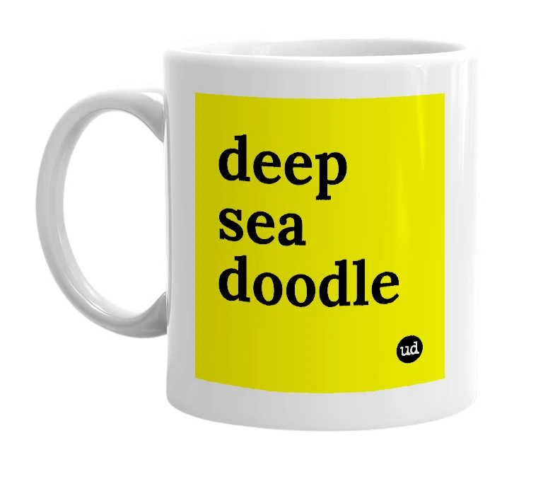 White mug with 'deep sea doodle' in bold black letters