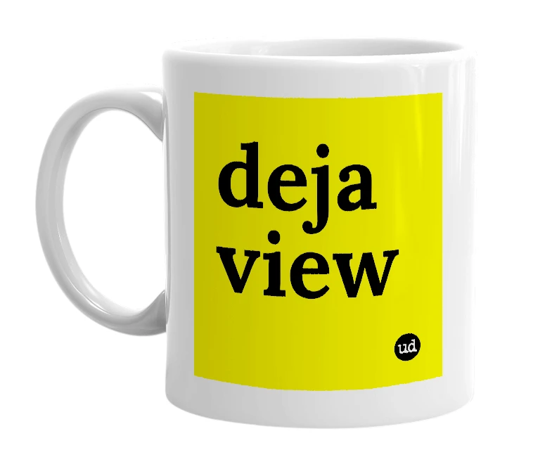 White mug with 'deja view' in bold black letters