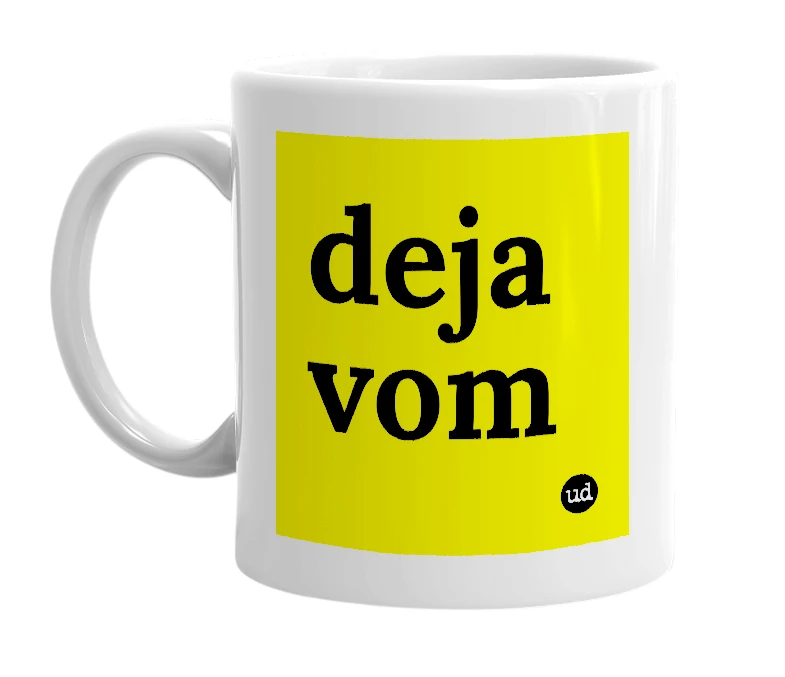 White mug with 'deja vom' in bold black letters