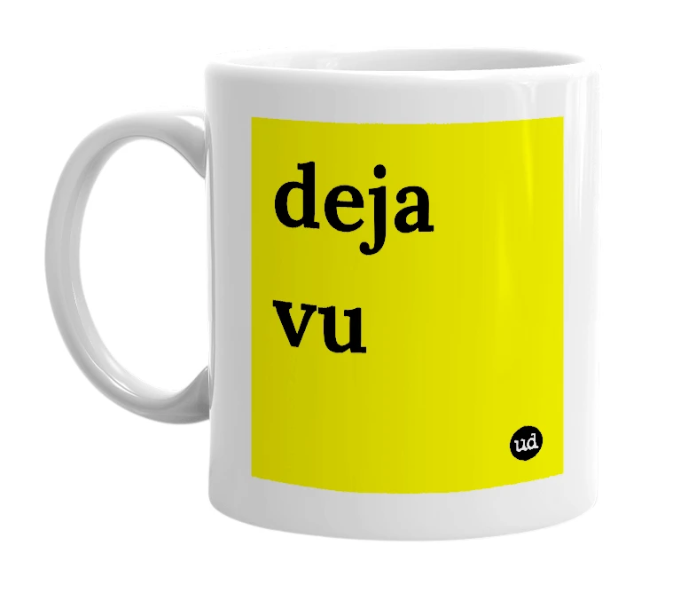White mug with 'deja vu' in bold black letters