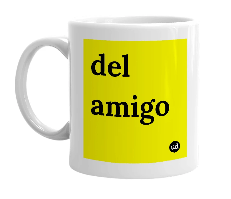 White mug with 'del amigo' in bold black letters
