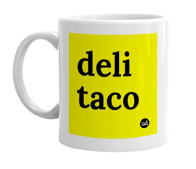 White mug with 'deli taco' in bold black letters