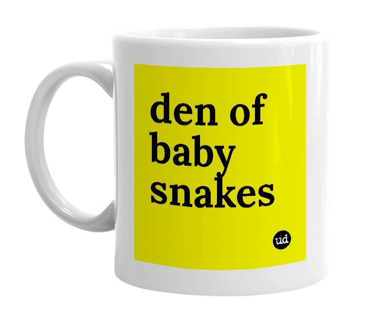 White mug with 'den of baby snakes' in bold black letters