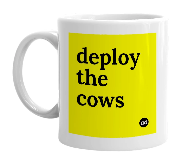 White mug with 'deploy the cows' in bold black letters