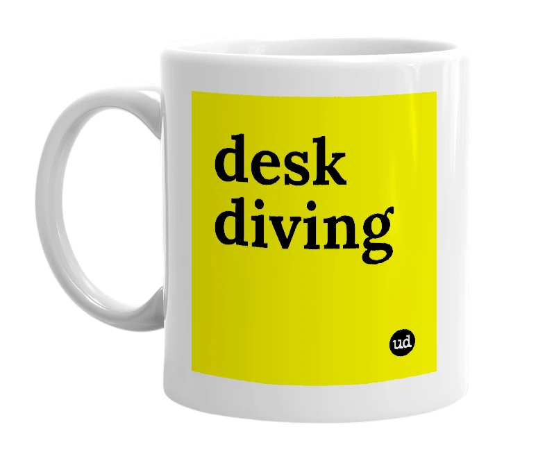 White mug with 'desk diving' in bold black letters