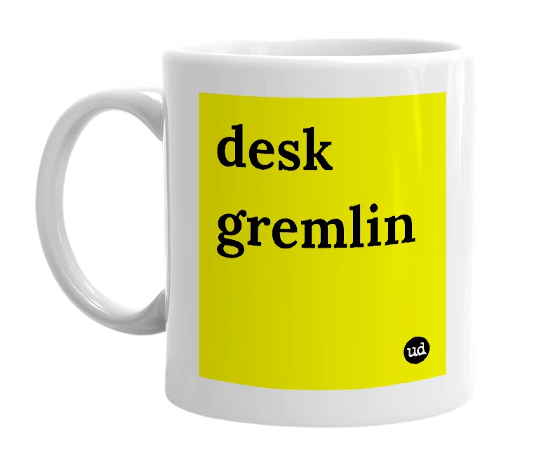 White mug with 'desk gremlin' in bold black letters