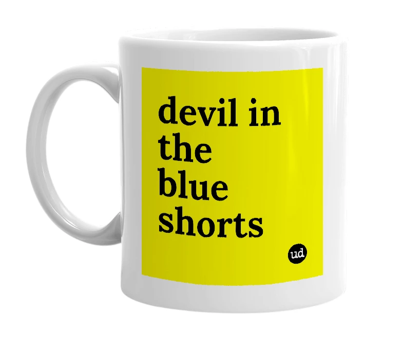 White mug with 'devil in the blue shorts' in bold black letters