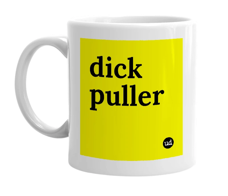 White mug with 'dick puller' in bold black letters