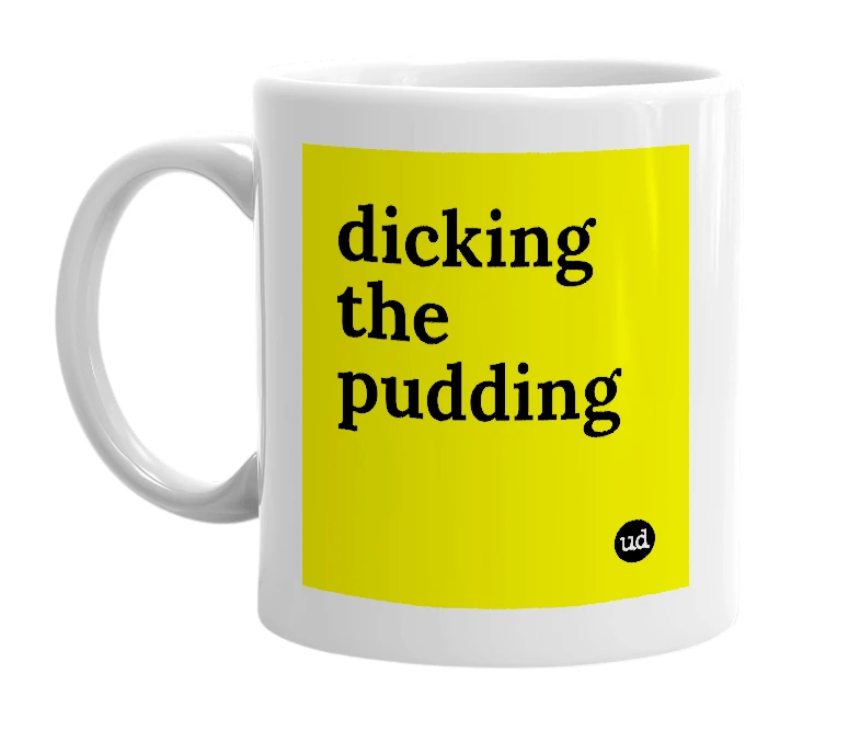 White mug with 'dicking the pudding' in bold black letters