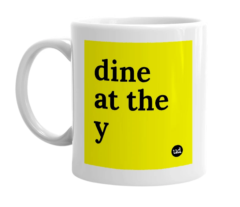 White mug with 'dine at the y' in bold black letters