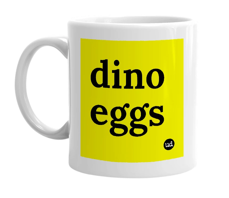 White mug with 'dino eggs' in bold black letters