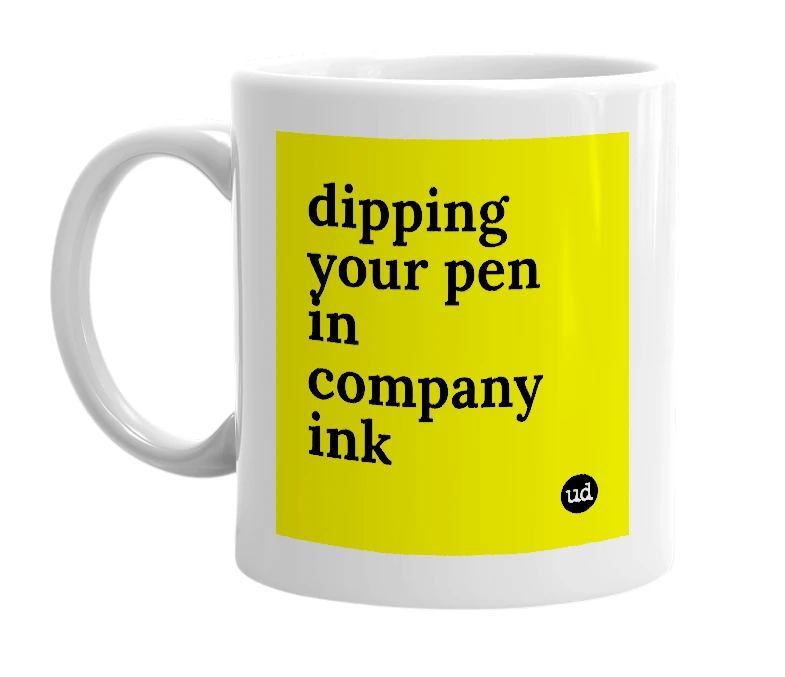 White mug with 'dipping your pen in company ink' in bold black letters