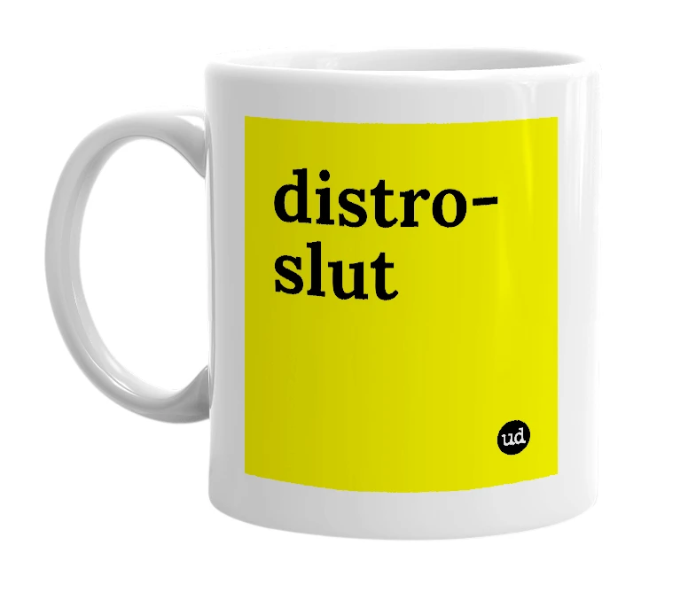 White mug with 'distro-slut' in bold black letters