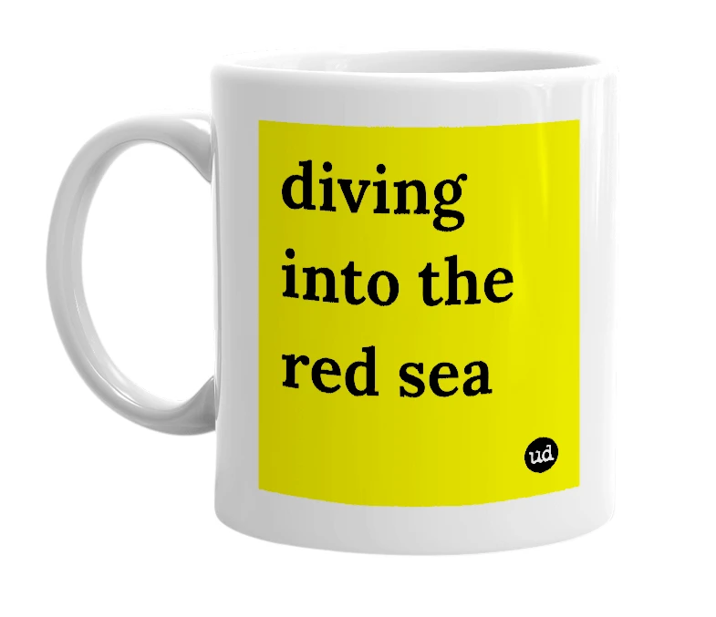 White mug with 'diving into the red sea' in bold black letters
