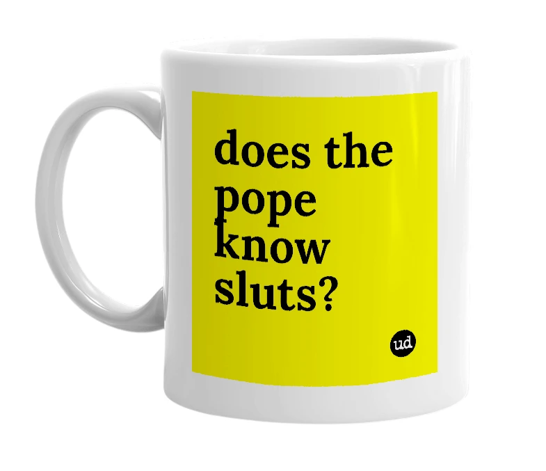 White mug with 'does the pope know sluts?' in bold black letters