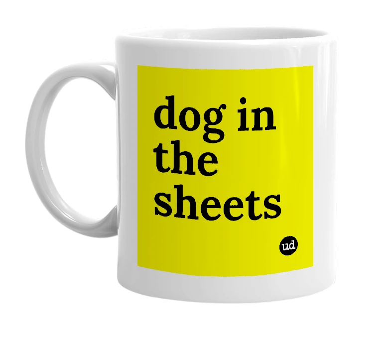 White mug with 'dog in the sheets' in bold black letters