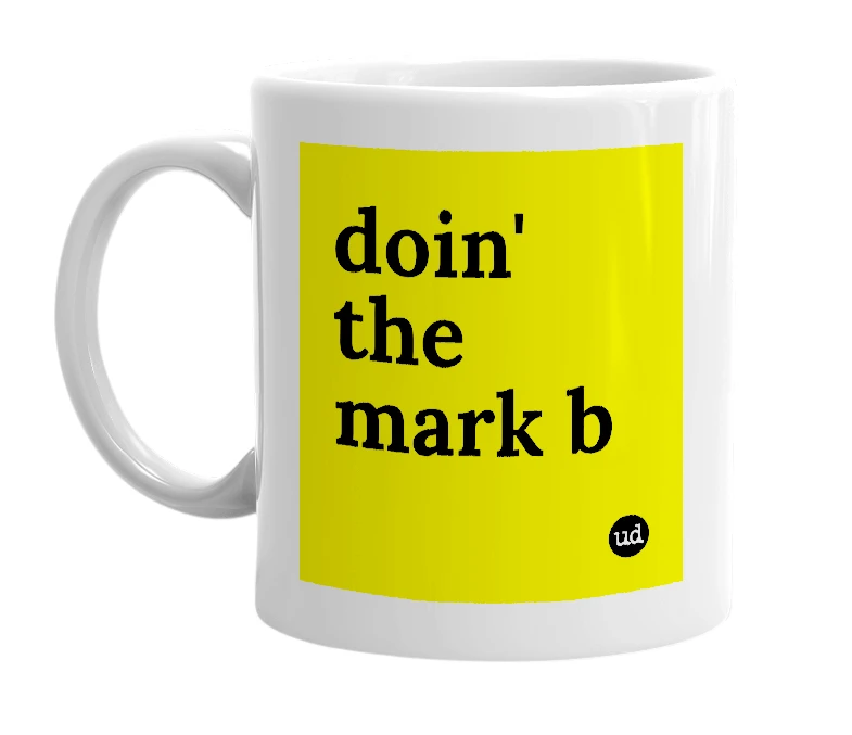 White mug with 'doin' the mark b' in bold black letters