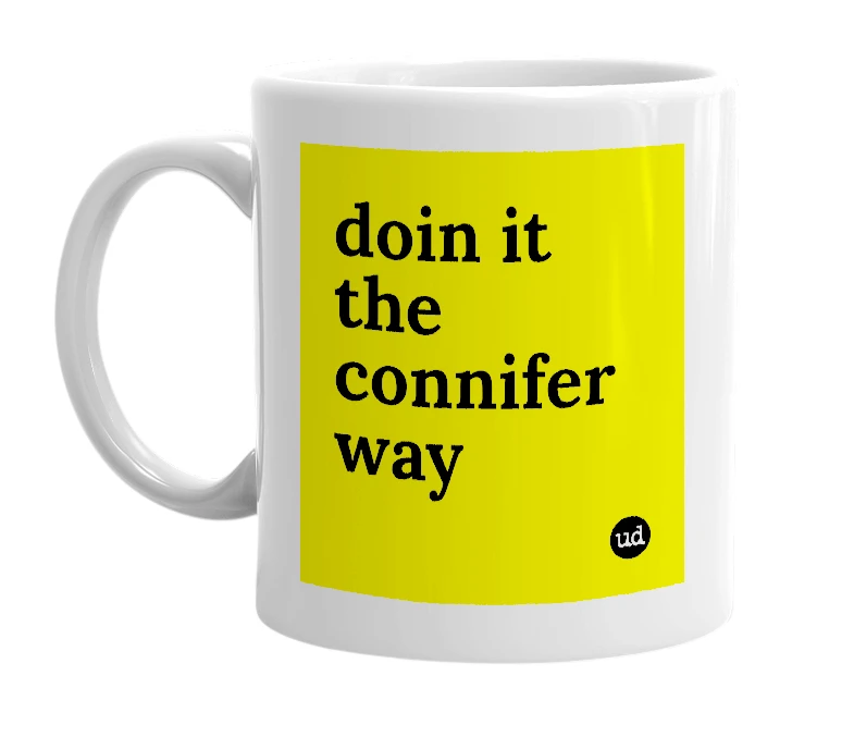 White mug with 'doin it the connifer way' in bold black letters