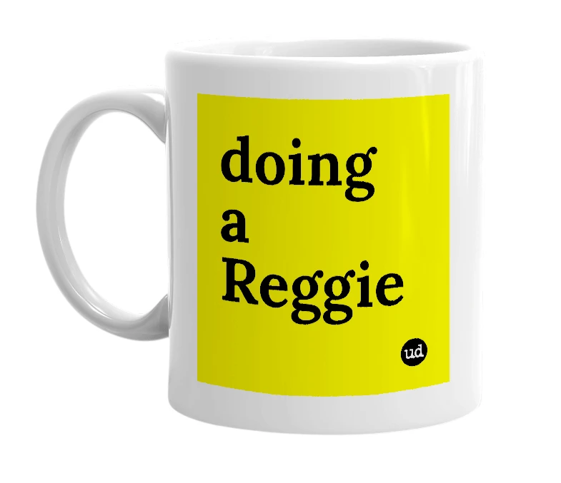 White mug with 'doing a Reggie' in bold black letters