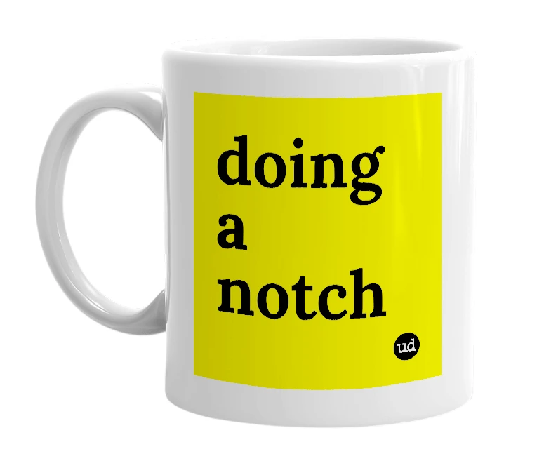 White mug with 'doing a notch' in bold black letters