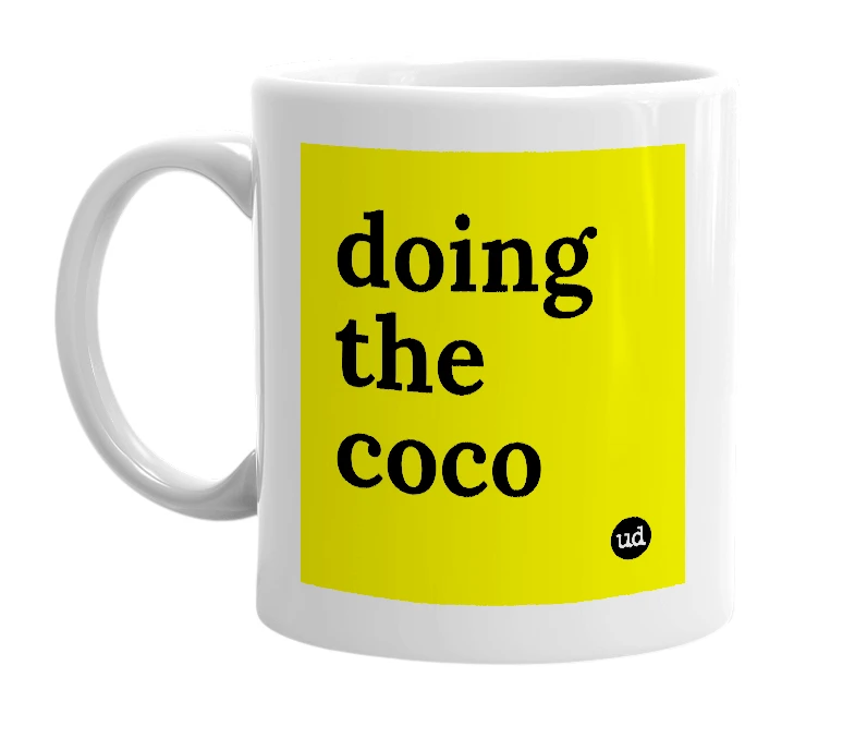 White mug with 'doing the coco' in bold black letters