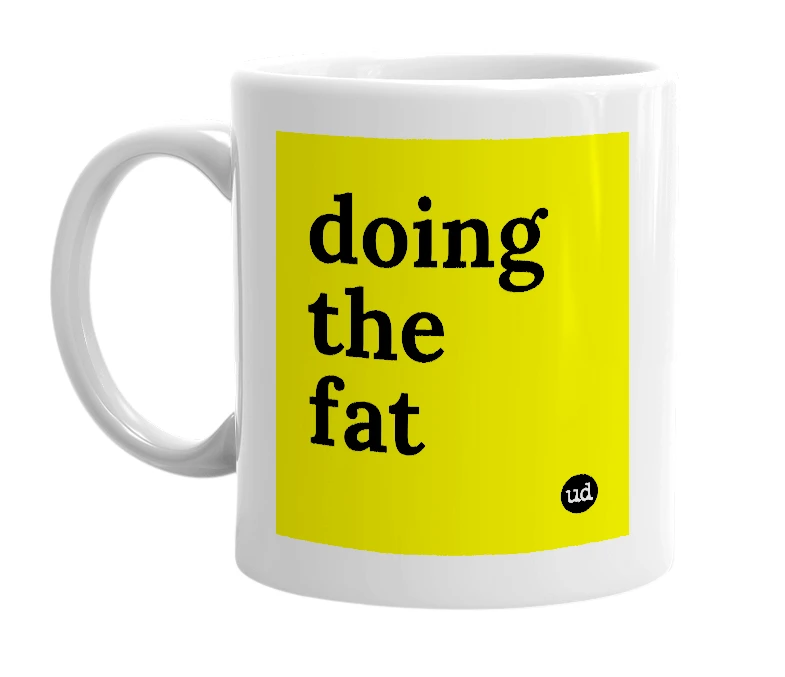 White mug with 'doing the fat' in bold black letters