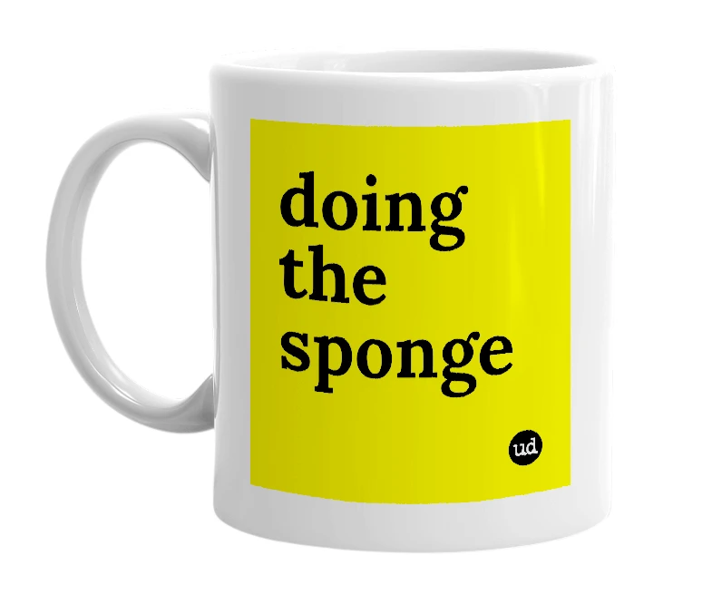 White mug with 'doing the sponge' in bold black letters
