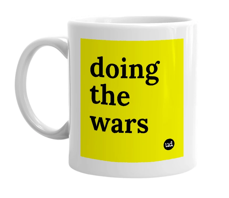 White mug with 'doing the wars' in bold black letters